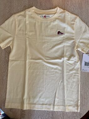 Jordan Brand AJ1 Patch Logo Tee in a light yellow